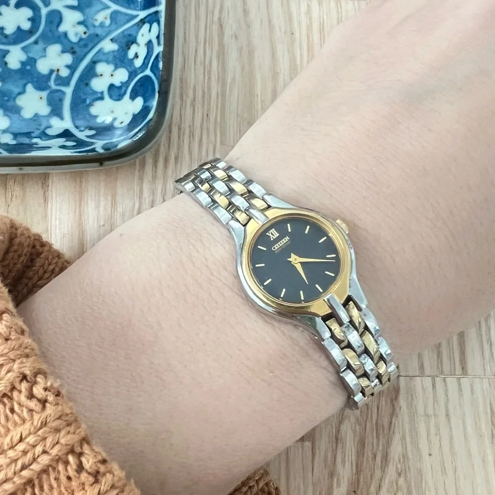 Citizen eco drive ladies black dial two tone dress solar watch